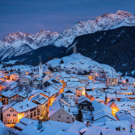 the Swiss village of Ardez covered by snow during the winter, Switzerland